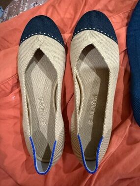 Rothy's Beige Ballet Flats with Black Toe and Blue Trim
